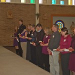 The 3rd Advent Candle, Fr. Bailey and 11 new candidates